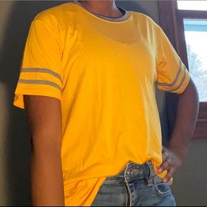 Yellow shirt with grey short striped sleeves
